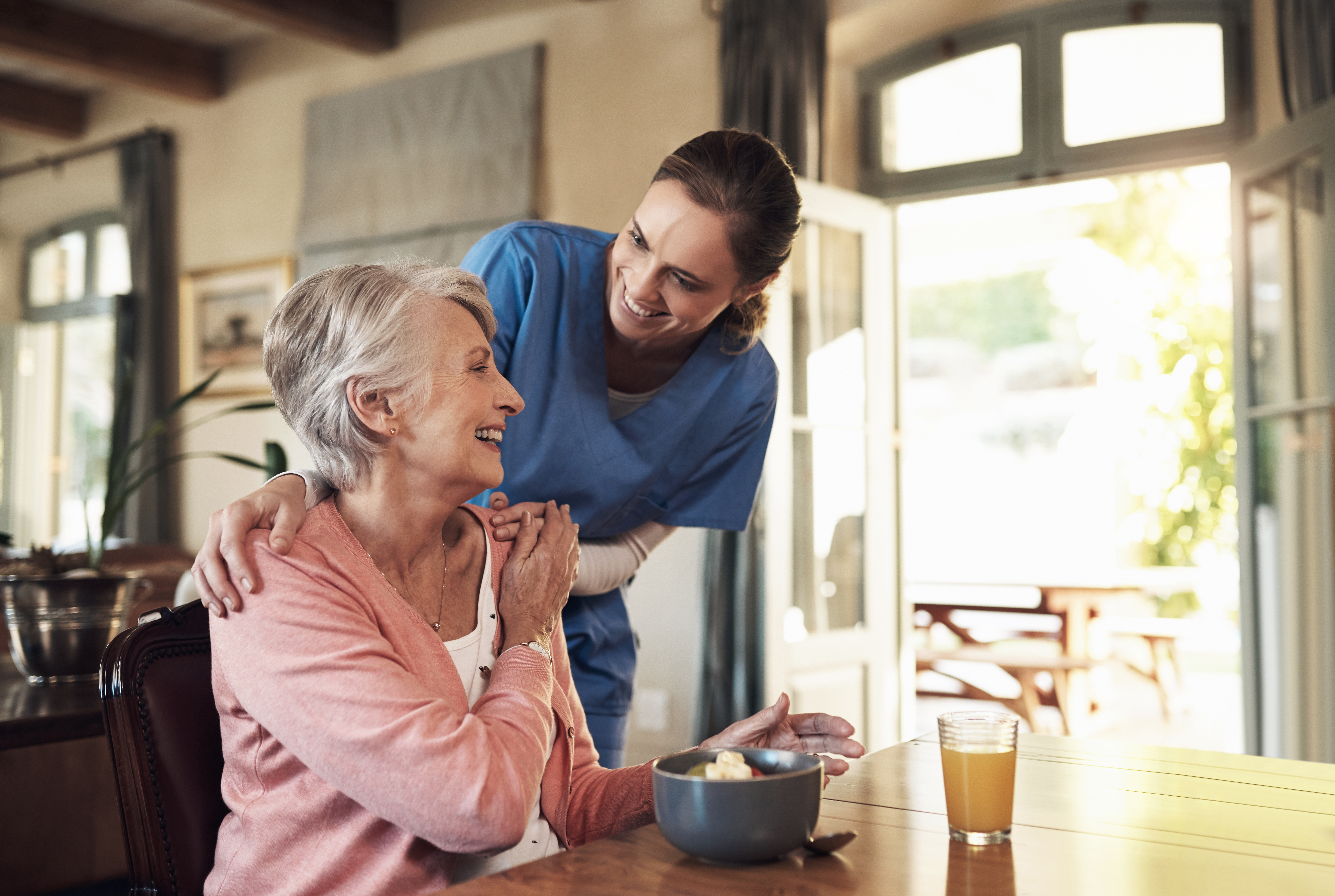 Caregiver with senior and toolbox